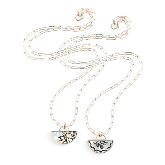 half moon mother of pearl pendant, etched with botanical illustration & blackberry design., on silver chains
