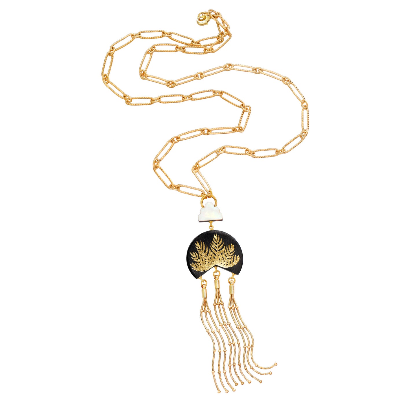 leather medallion pendant, with gold palm tree print, long gold chain tassels, and mother of pearl cloud, on long-link gold chain