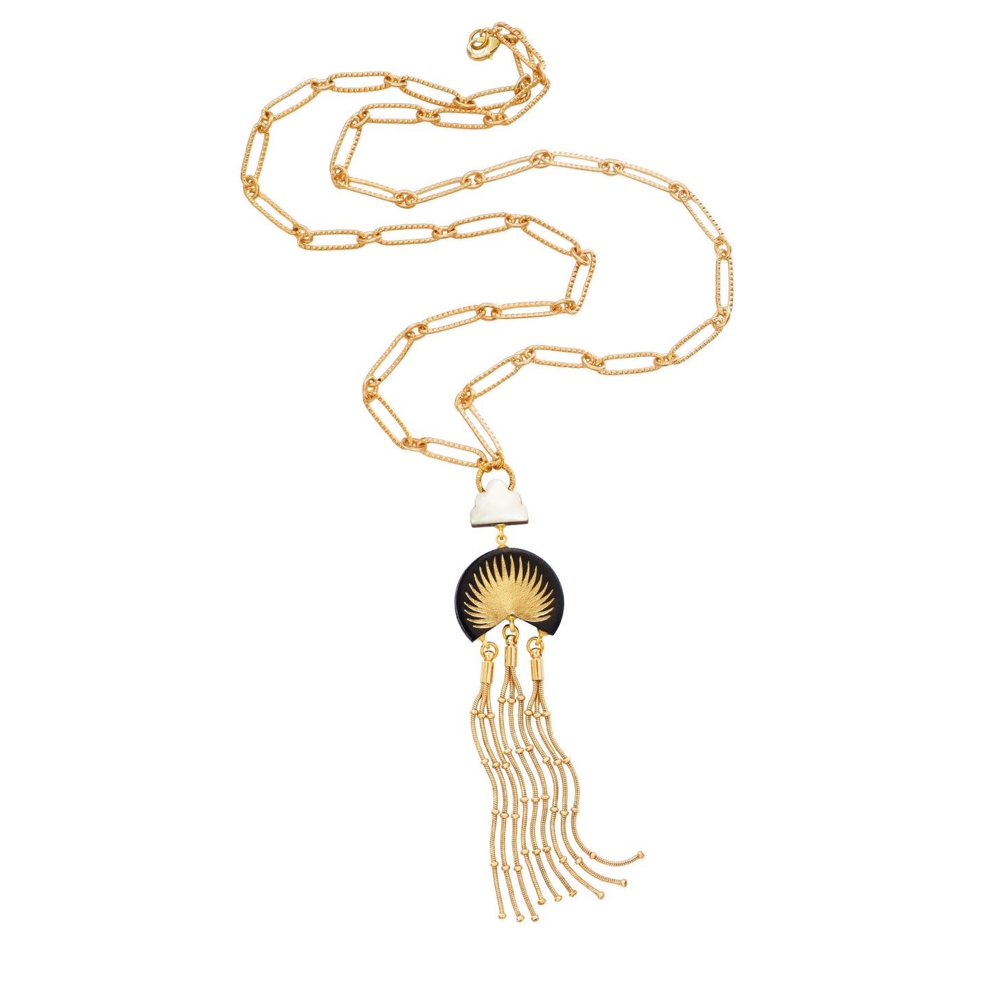 leather medallion pendant, with gold palm tree print, long gold chain tassels, and mother of pearl cloud, on long-link gold chain