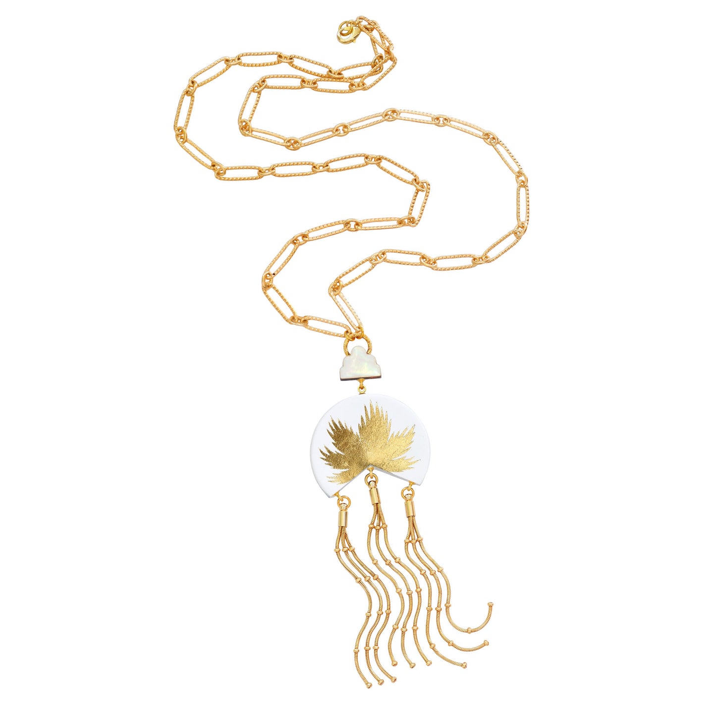 leather medallion pendant, with gold palm tree print, long gold chain tassels, and mother of pearl cloud, on long-link gold chain