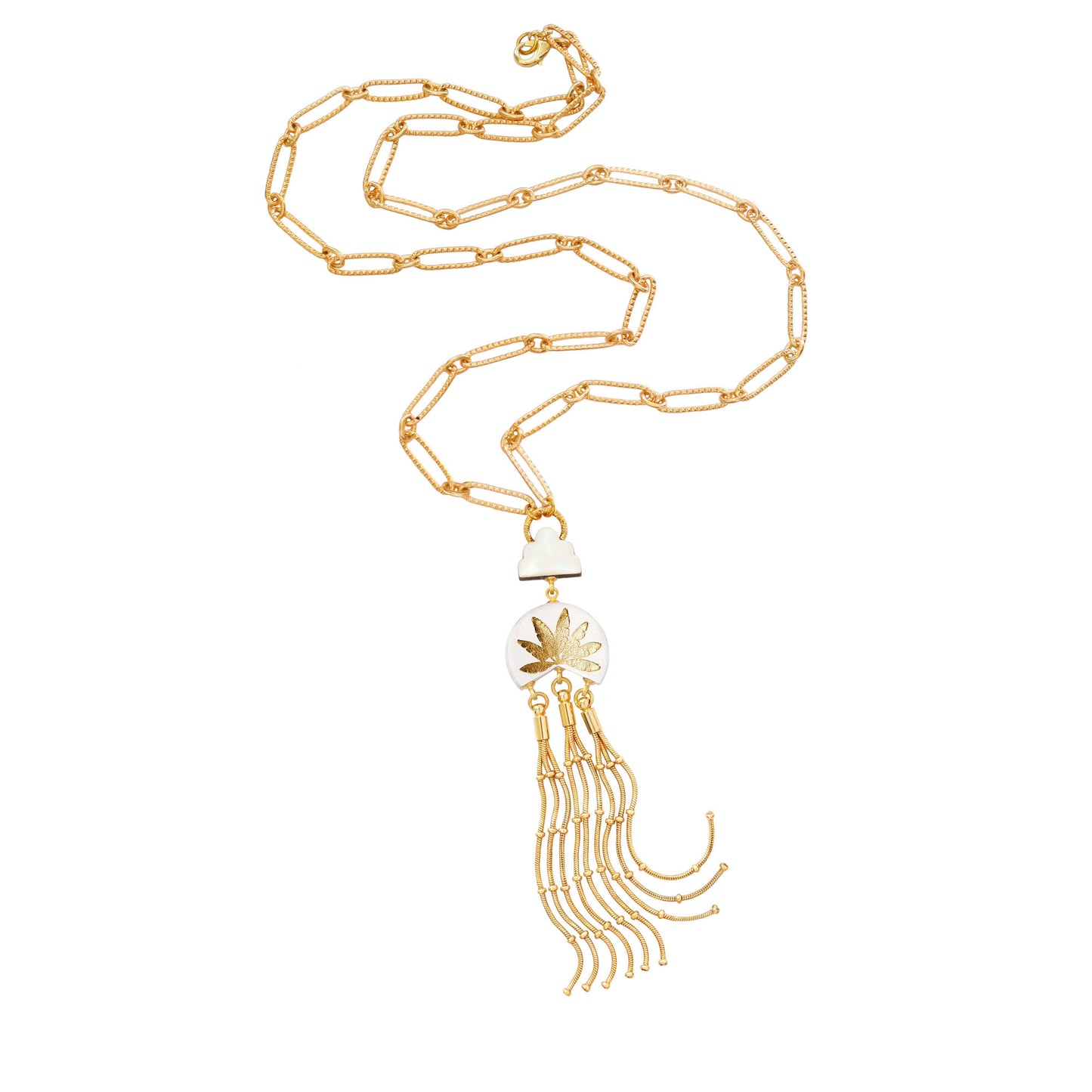 leather medallion pendant, with gold palm tree print, long gold chain tassels, and mother of pearl cloud, on long-link gold chain