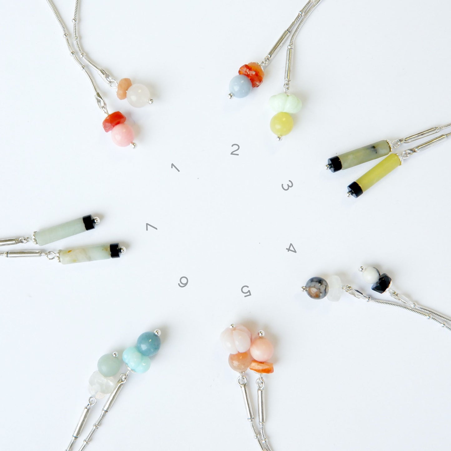 7 different combinations of double gemstone bead tips, on sterling silver beaded snake chain.