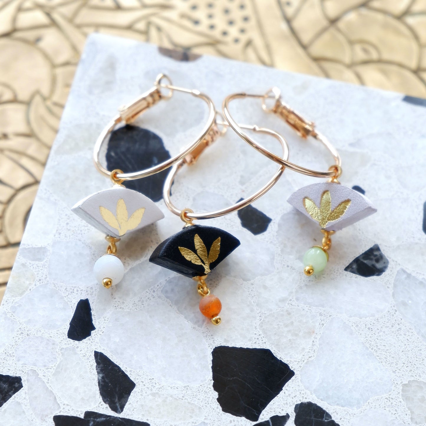 white, black, lilac & gold palm print leather gold hoop earrings with coloured glass & gemstone beads