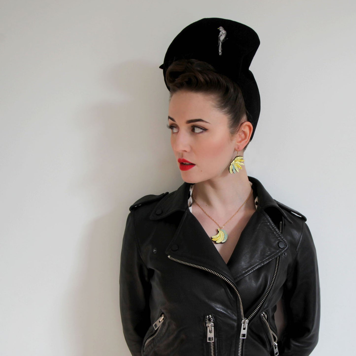 yellow leather banana earrings, blue banana, model