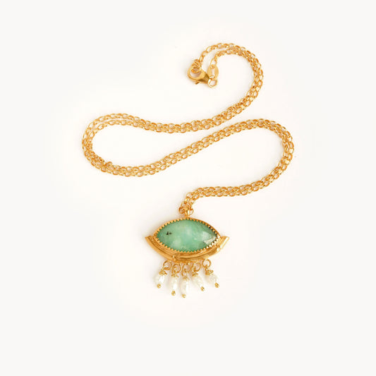 Green peruvian Opal "eye" pendant. Bamboo "hammock" style pendant, with faceted marquise cut gemstone, in gold vermeil, with a fringe of freshwater pearls, on gold chain. white background.