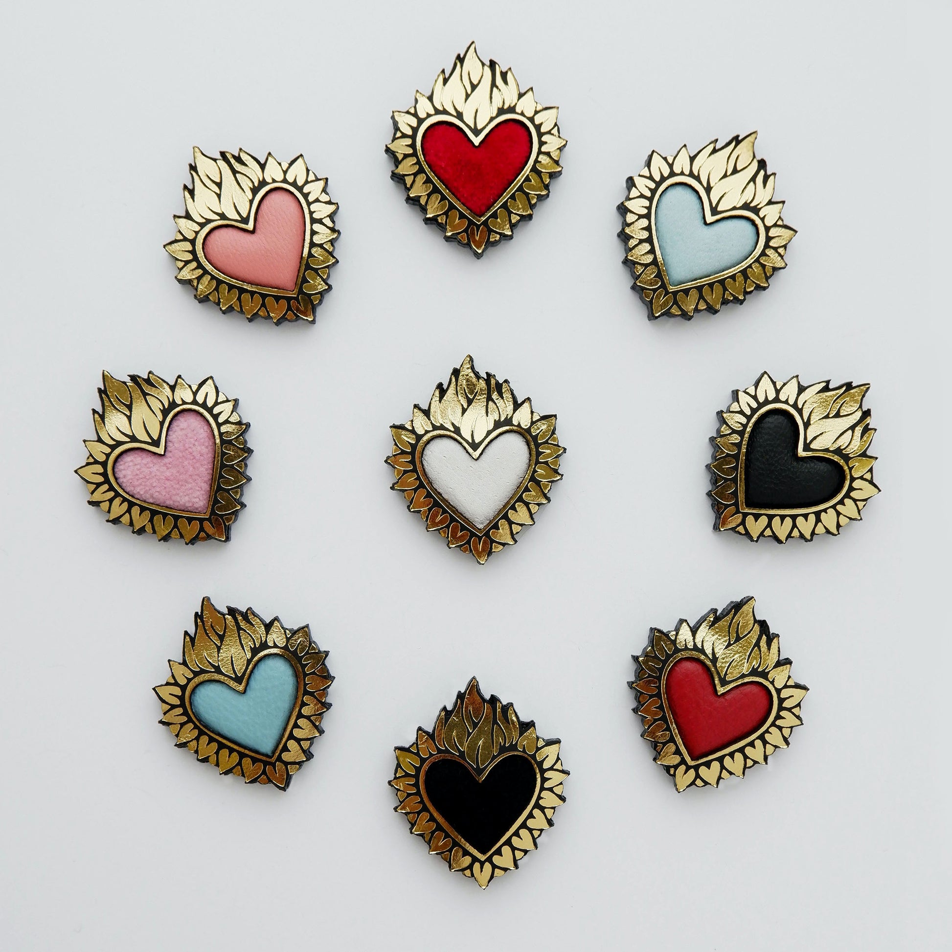 Flaming Heart jewels, in Gold Foiled Leather, with a coloured padded leather centres, in leather & velvet. ( 9 different colours)