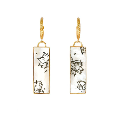 dotted gold hoop earrings with large rectangular drop pendants in Mother of pearl, engraved with graphic botanical cobnut design