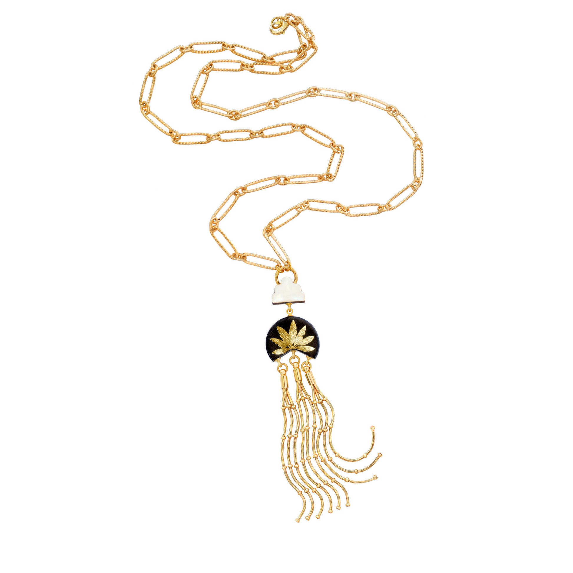 leather medallion pendant, with gold palm tree print,  long gold chain tassels, and mother of pearl cloud, on long-link gold chain