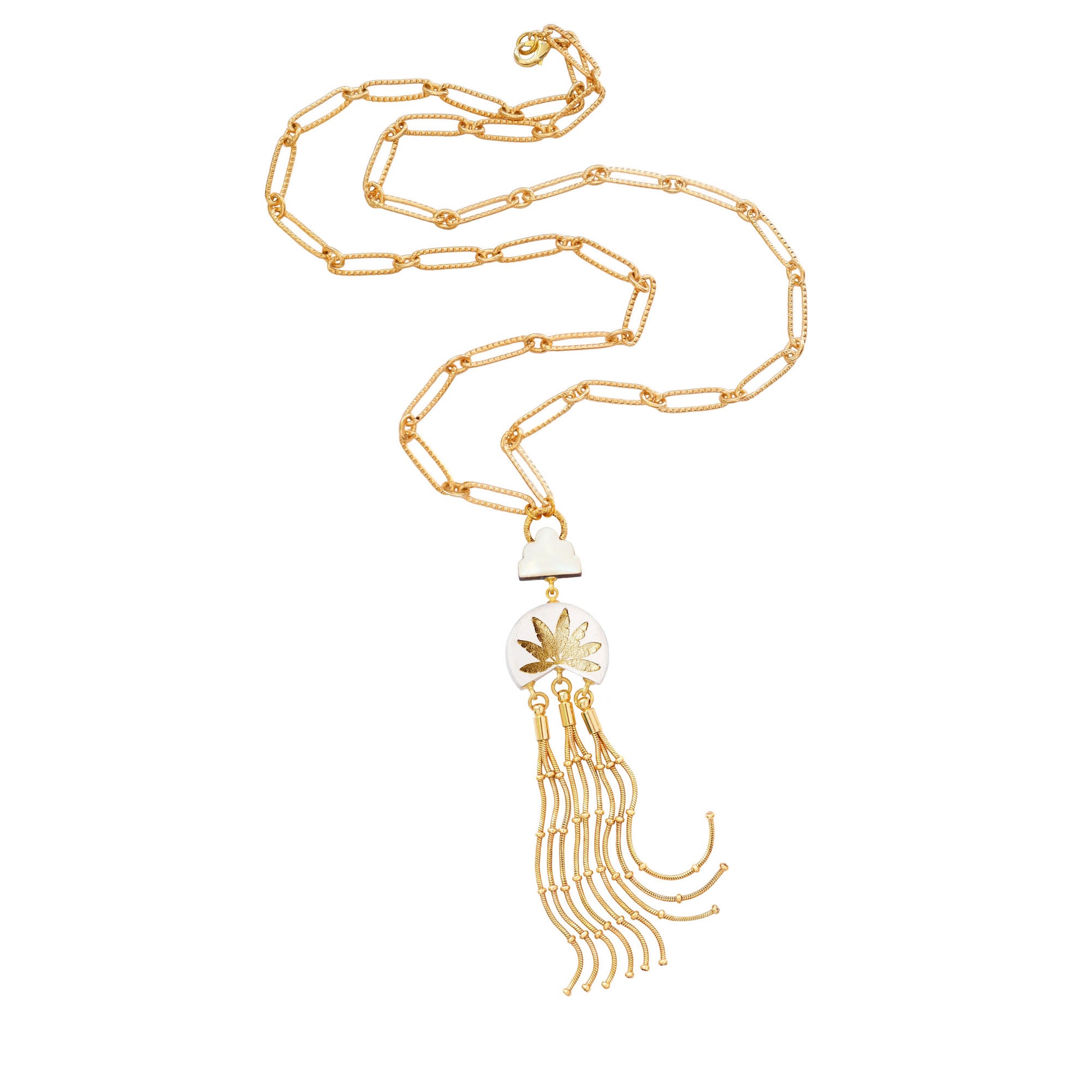 leather medallion pendant, with gold palm tree print,  long gold chain tassels, and mother of pearl cloud, on long-link gold chain