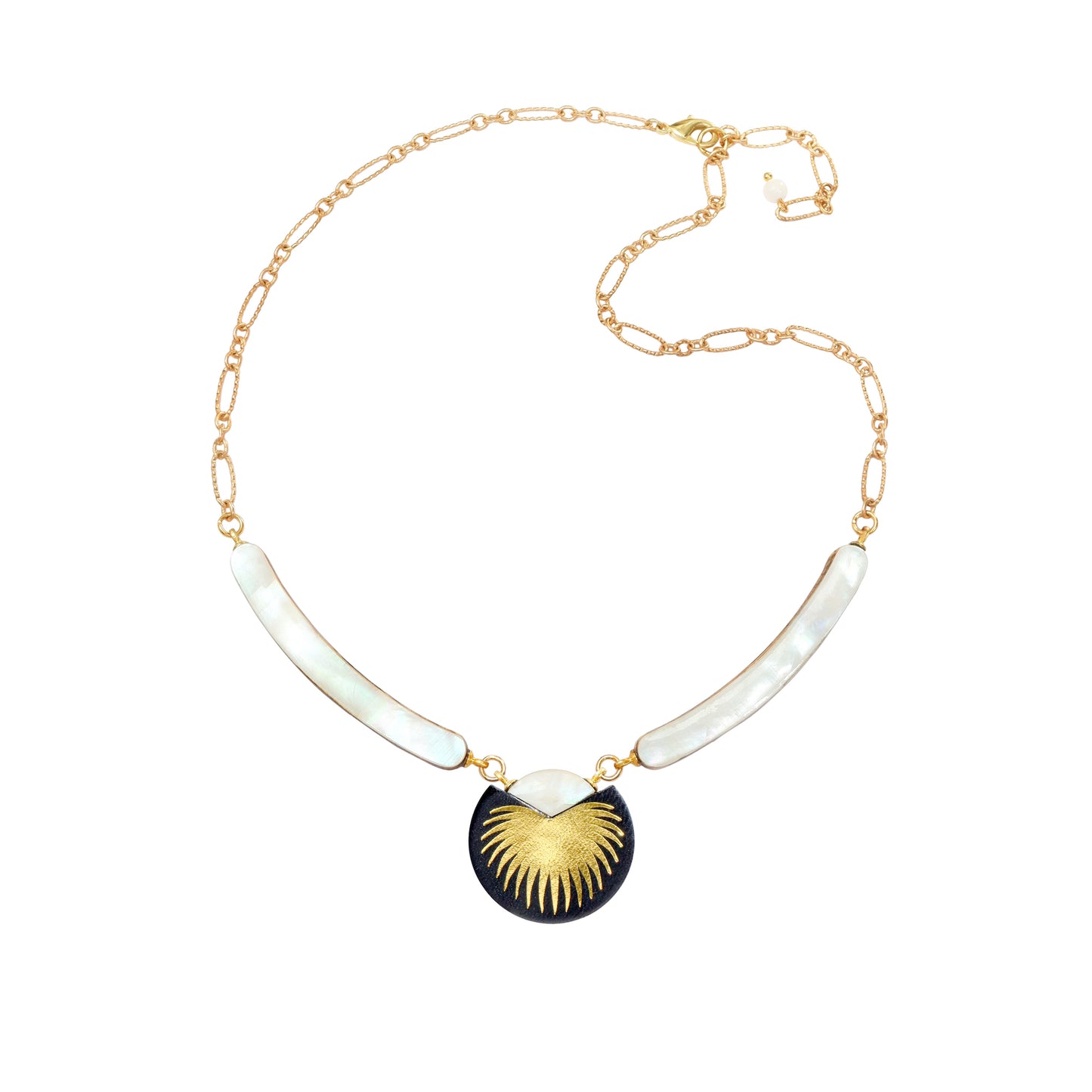 necklace with curved mother of pearl bars , black leather medallion with a gold palm print