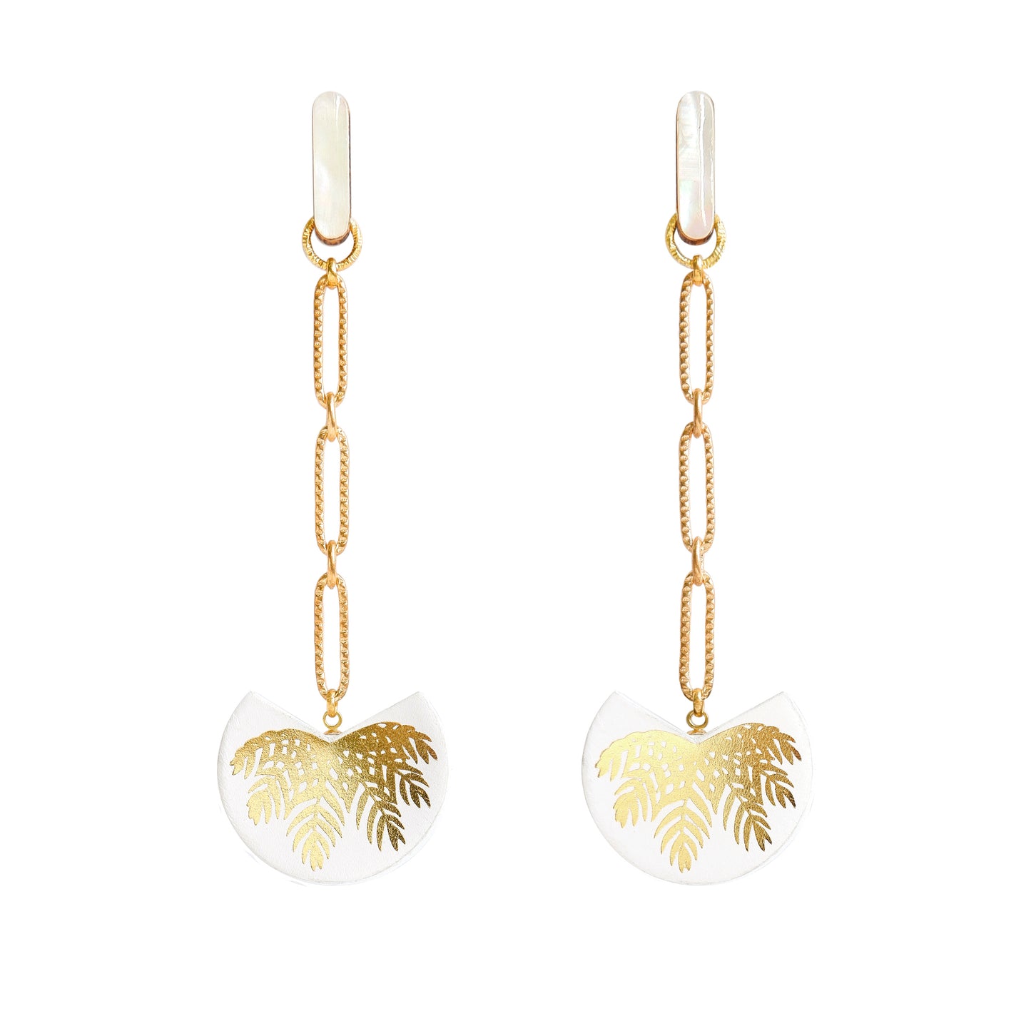 palm tree drop earrings. White leather medallions with gold palm print, on longl-link chain from long mother of pearl studs