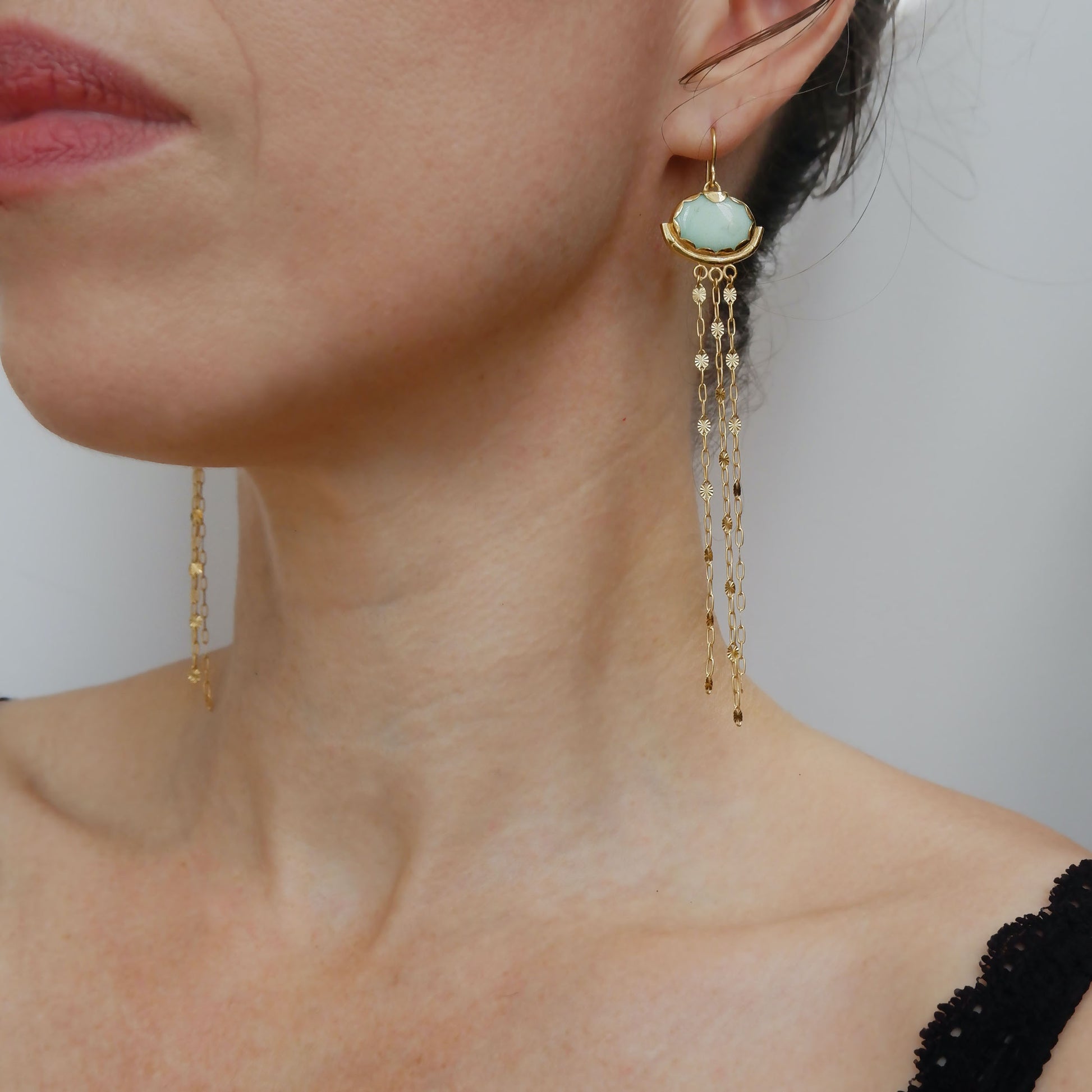 Gold vermeil and pastel mint gemstone chandelier earrings. milky Chrysoprase ovals, with subtle natural marbling, are encased in a pretty Gold Vermeil scalloped frame, gently resting in a slender bamboo "hammock", and adorned with the delicate starburst chain tassels.