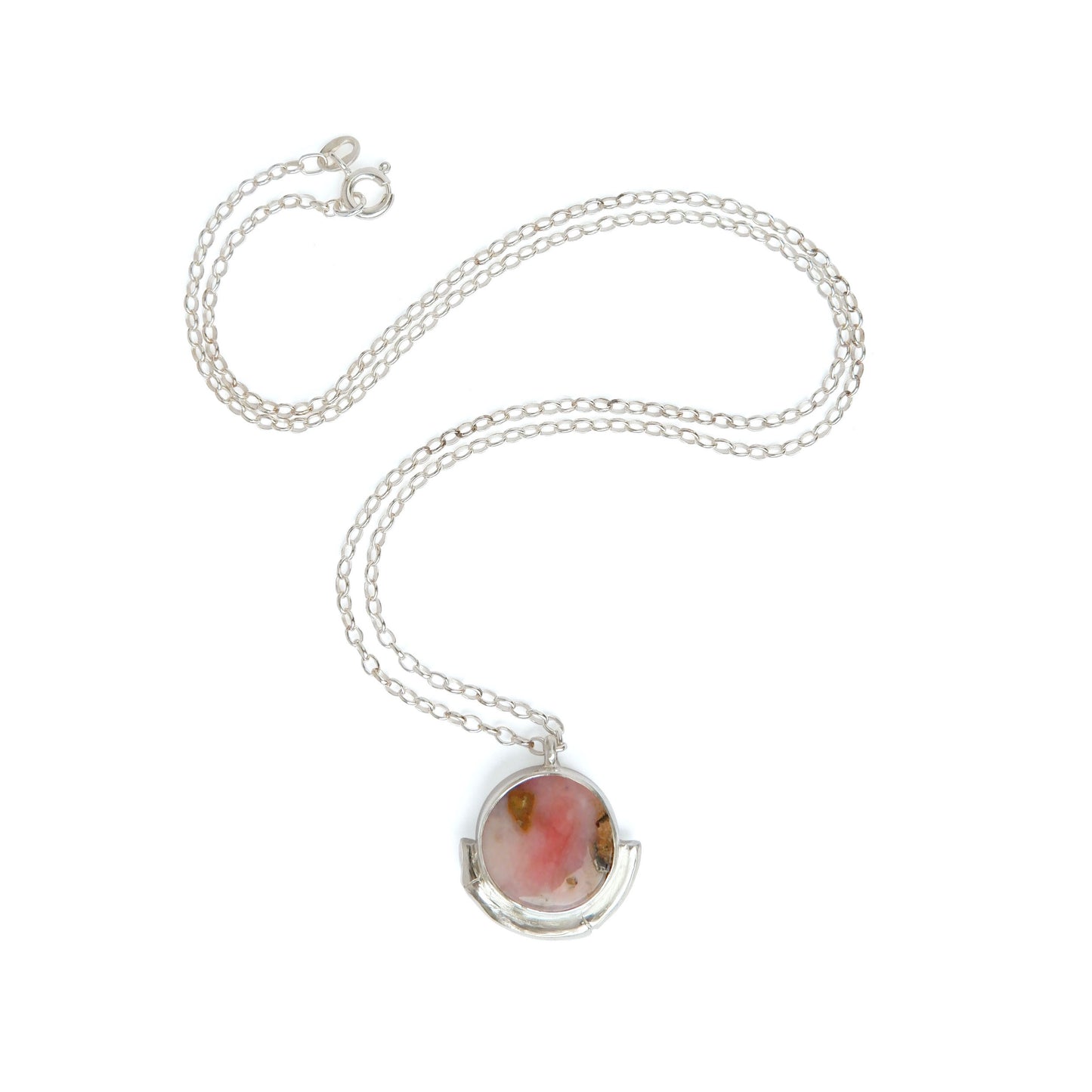 pink Opal gemstone circle pendant, framed by a silver bamboo style half moon halo mount, on a fine silver chain.