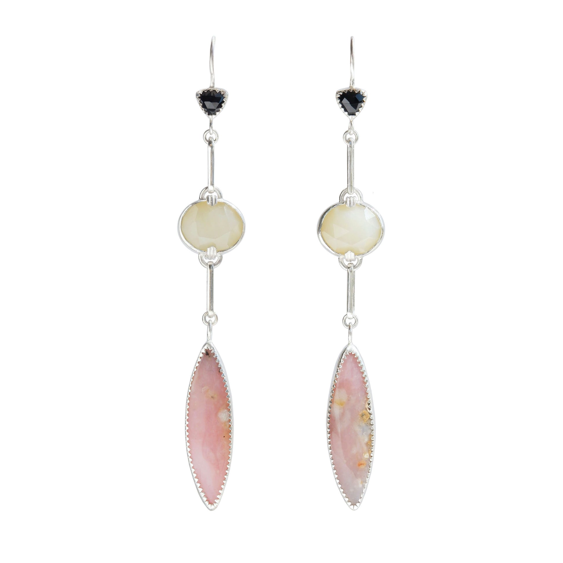 A pair of long drop earrings handcrafted in recycled Sterling Silver, featuring stunning Peruvian Pink Opal Marquise Cabochons, rare faceted butter-yellow Kenyan Opal ovals, and tiny faceted black Onyx Trillions. White background