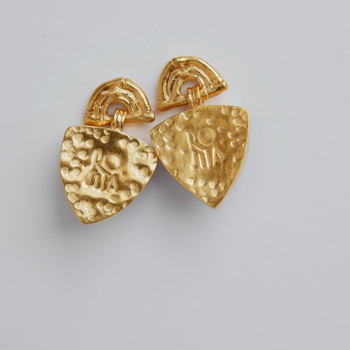 Gold Vermeil stud drop earrings , featuring triple arches of bamboo, paired with a hanging Trillion shaped gemstone charm pendant, shown from the back, with Rosita Logo & hammered texture.