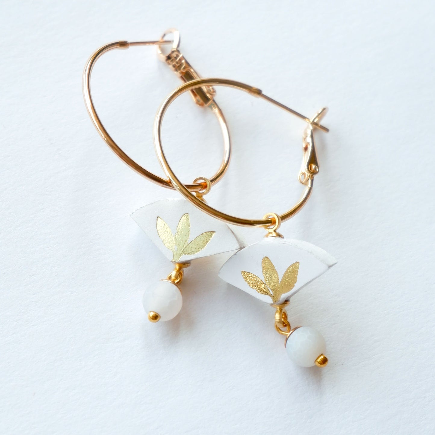 white & gold palm print leather gold  hoop earrings with white bead