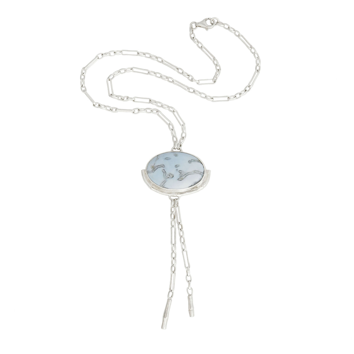 Silver Lariat style chain necklace, with a large marbled pale sky blue peruvian opal pendant, framed  by a half halo of silver bamboo. 