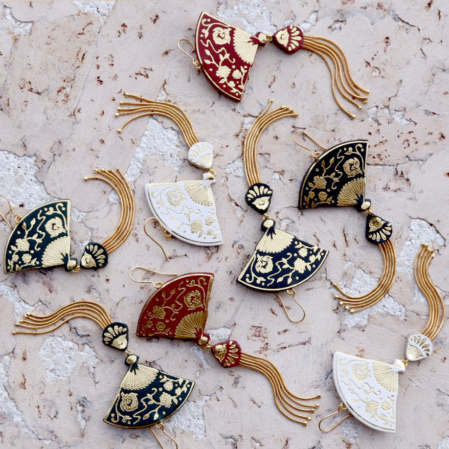 tasselled fan earrings in black, ox blood & white, with gold