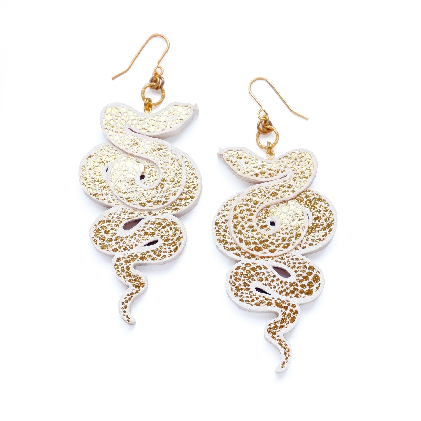 white & gold vegan serpent earrings